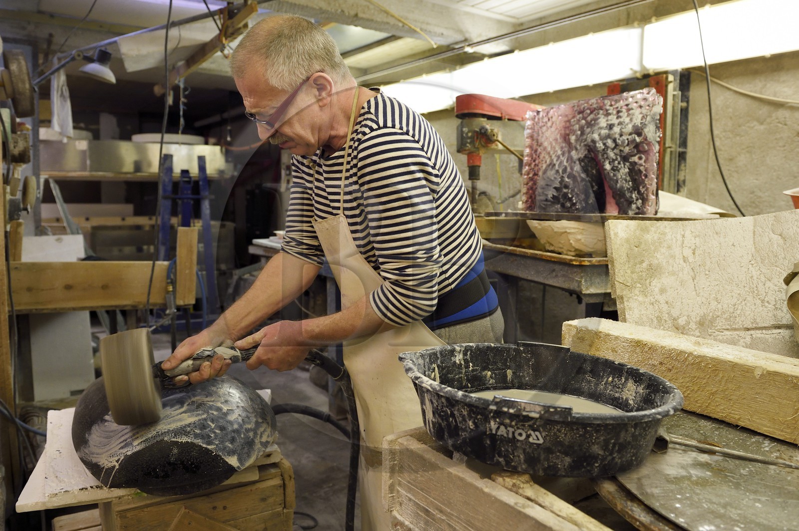 Czech Republic, Prague, glass sculptor artist Jaromir Rybak in his workshop