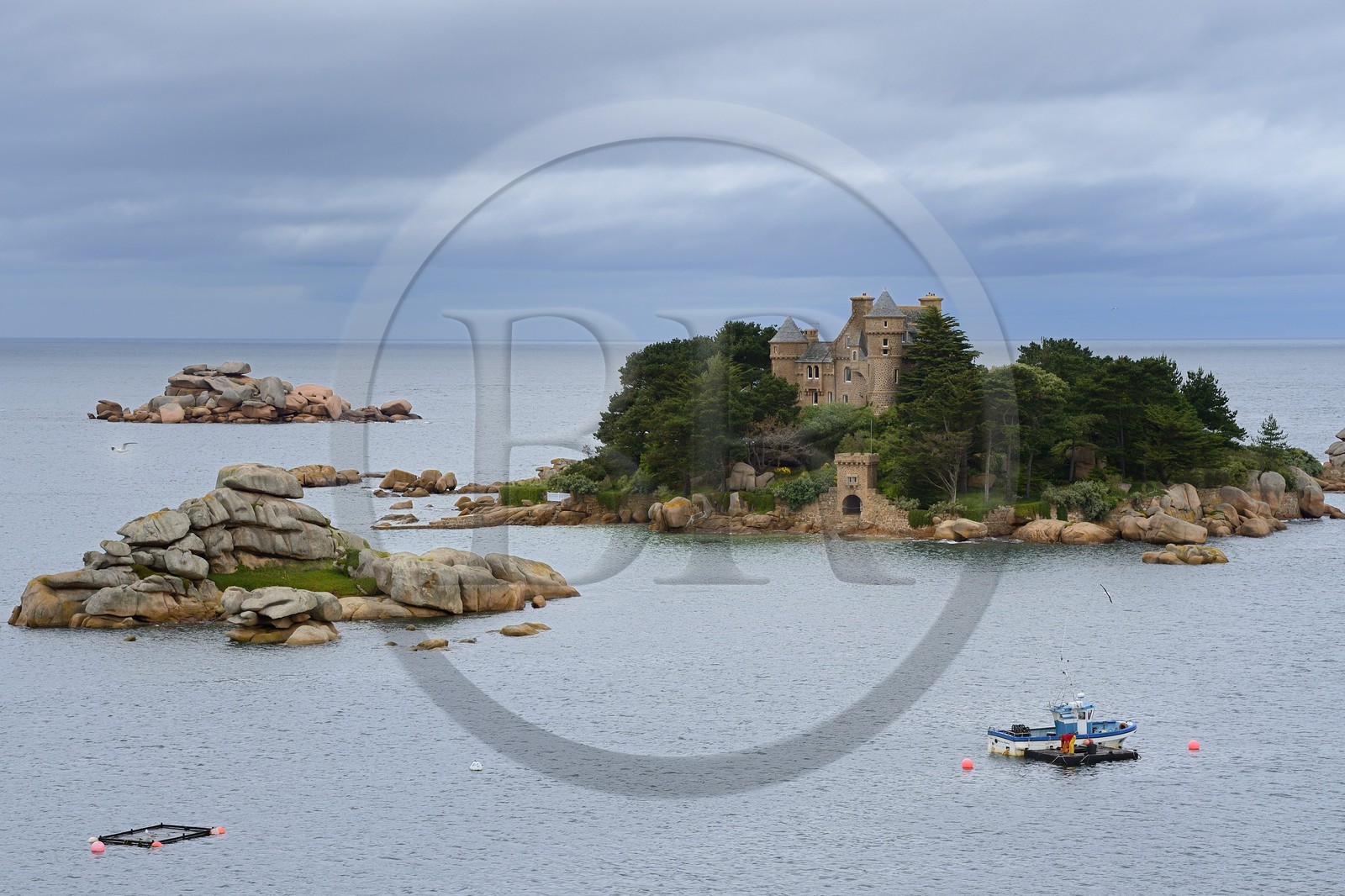 France, Cotes-d'Armor, Cote de Granit Rose (the Pink Granite coast), Tregastel, Costaeres castle and island, fishing boat