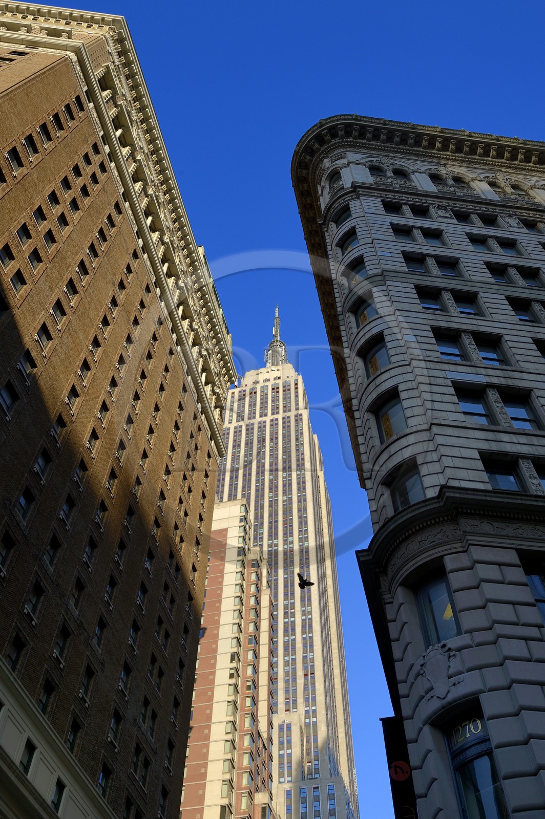 United States, New York, Manhattan, Midtown, the Empire State Building and buildings from the 6th Avenue - Avenue of the Americas