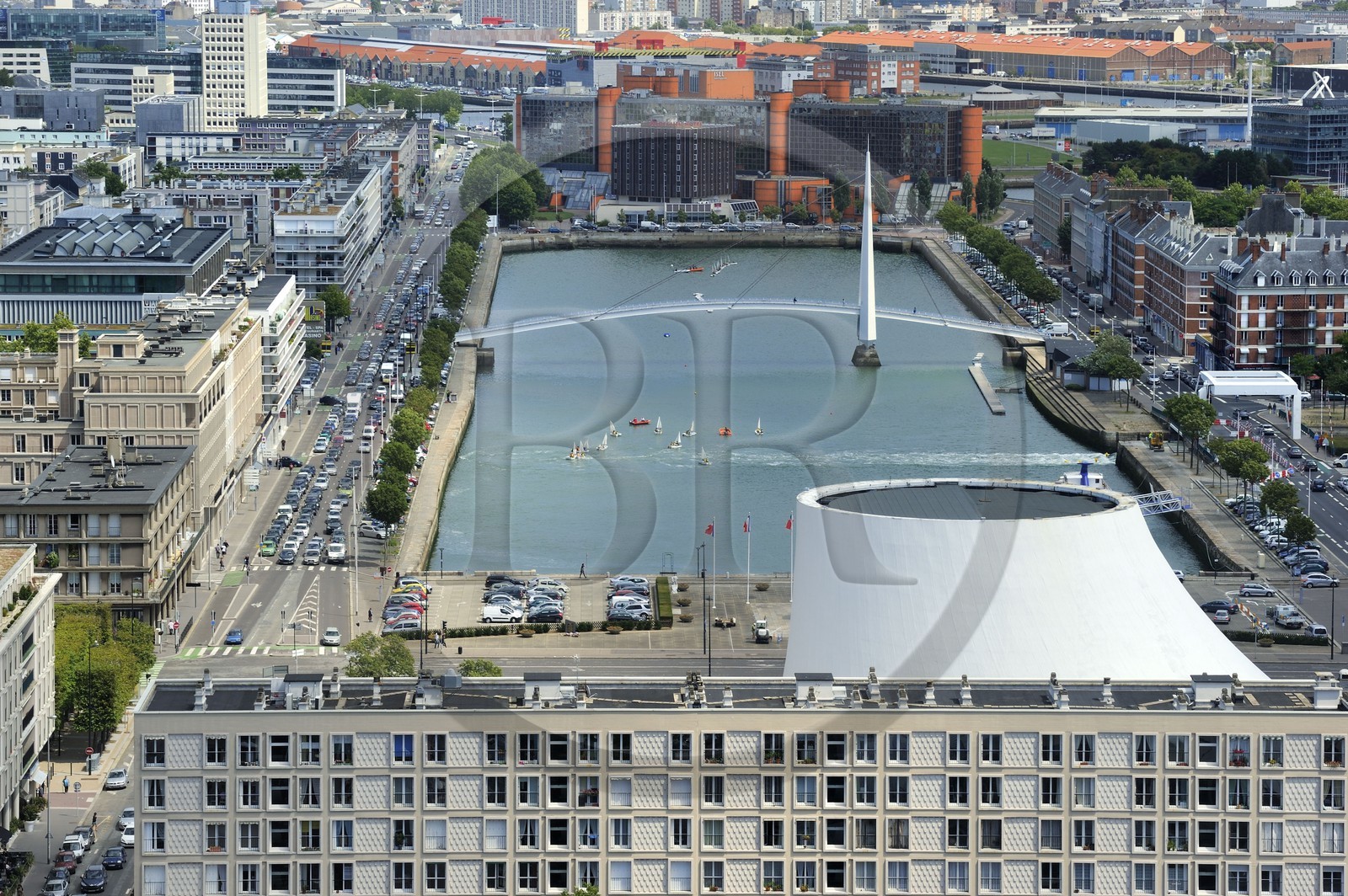 France, Seine Maritime, Le Havre, Downtown rebuilt by Auguste Perret listed as World Heritage by UNESCO, Perret buildings around the Bassin du Commerce and the summit of Volcan created by Oscar Niemeyer