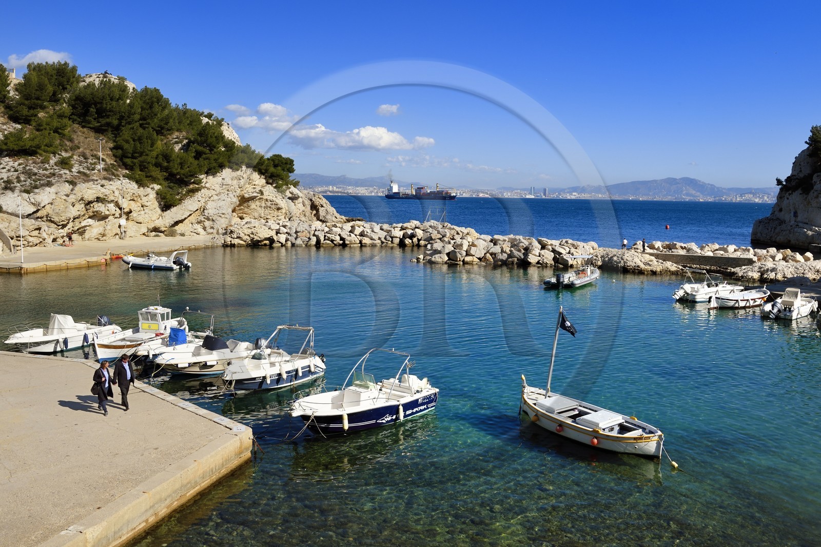France, Bouches du Rhone, Le Rove towards Marseille, the Cote Bleue (Blue Coast), hike from Niolon to Cap Méjean along the Customs Trail, the Niolon port and the city of Marseille in the background