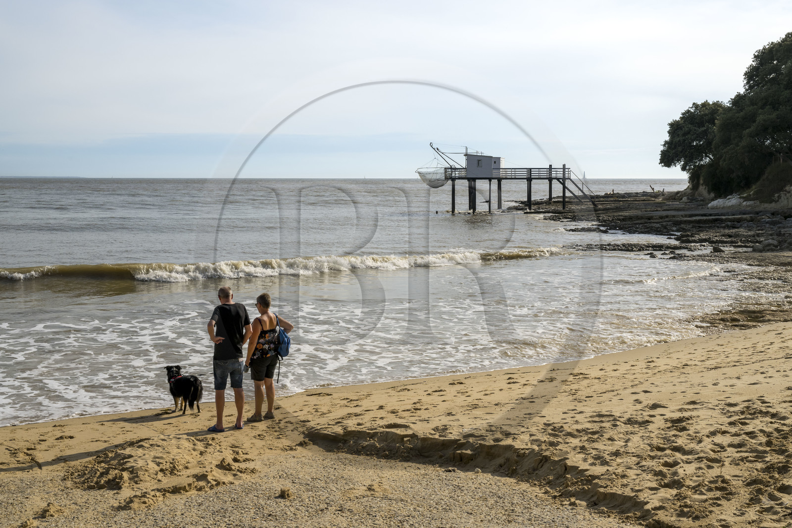 France, Charente-Maritime, Royan region, Saint Palais sur Mer, the Platin beach and traditional carrelet (fishing shack) in fishing huts in the background