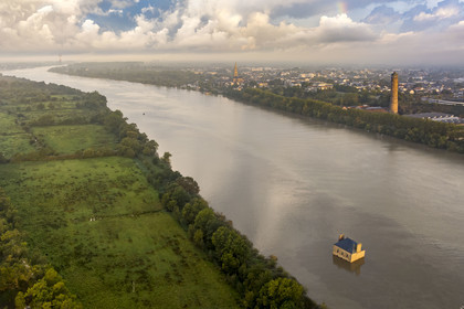 France, Loire Atlantique, Coueron, open-air contemporary art collection Estuaire, La Maison dans la Loire (The House in the Loire river) created by the artist Jean-Luc Courcoult and the 69 m high Shot Tower built in the 19th century (aerial view)