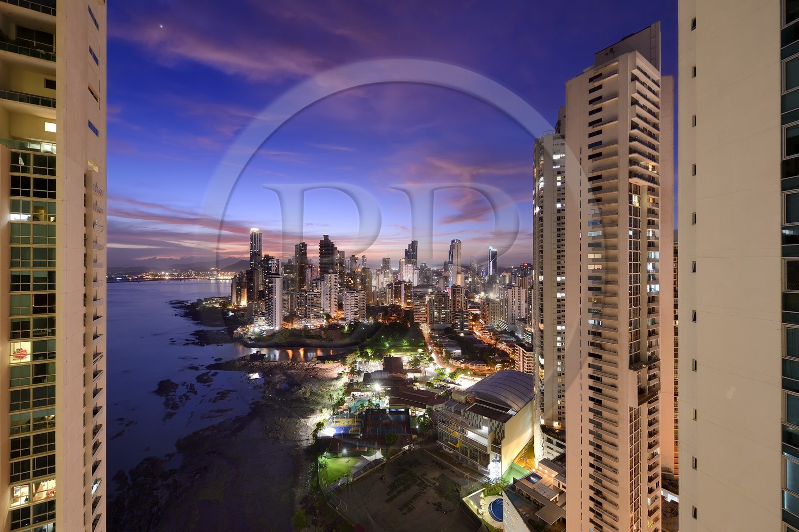 Panama, Panama City, waterfront skyscrapers of Punta Paitillia district after sunset