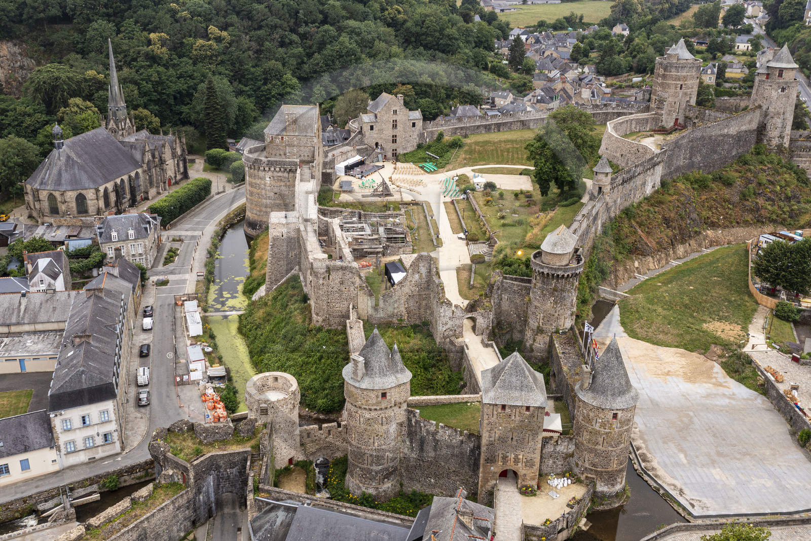 France, Ille-et-Vilaine, Fougeres, 12th century fortified castle and the Saint-Sulpice church (aerial view)
