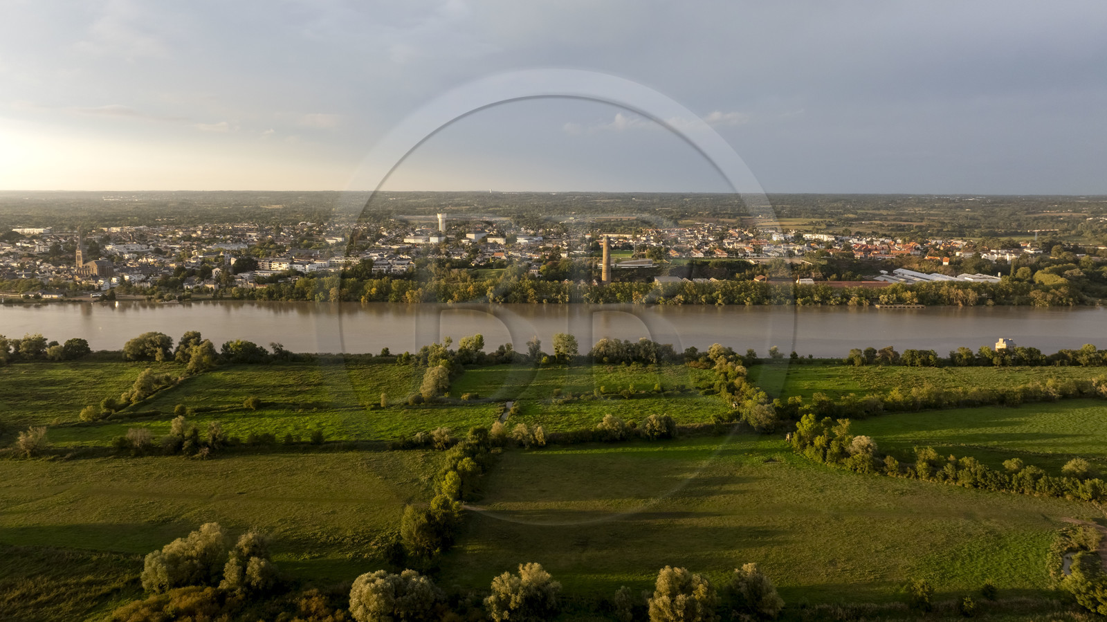 France, Loire Atlantique, Coueron, open-air contemporary art collection Estuaire, La Maison dans la Loire (The House in the Loire river) created by the artist Jean-Luc Courcoult and the 69 m high Shot Tower built in the 19th century (aerial view)