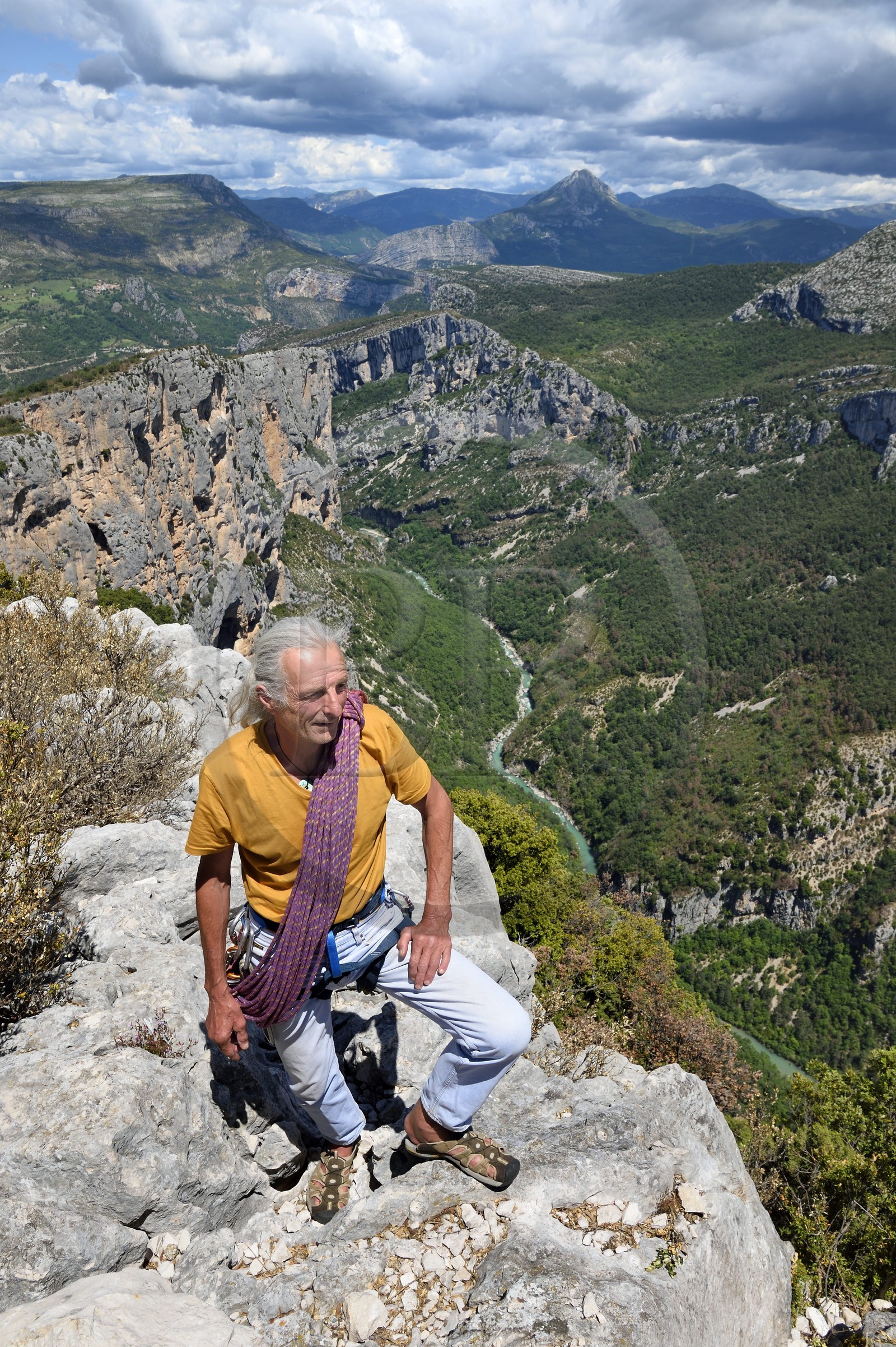 France, Alpes de Haute Provence, Parc Naturel Régional du Verdon, Grand Canyon of Verdon river, La Palud Sur Verdon, point of view of the Dent d'Aire, Bernard Gorgeon one of the pioneers of climbing in the massif and the Escalès cliff in the background