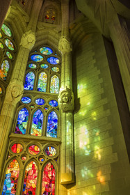 Spain, Catalonia, Barcelona, Eixample district, Sagrada Familia basilica by Catalan modernist architect Antoni Gaudi, listed as a UNESCO World Heritage Site, stained glass windows of the apse above the ambulatory by the Catalan painter and glassmaker Joan Vila-Grau