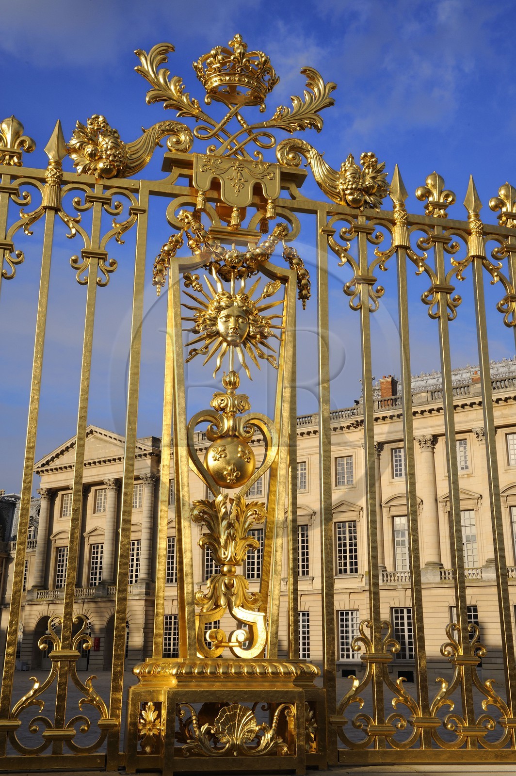 France, Yvelines, Chateau de Versailles, listed as World Heritage by UNESCO, detail of the Royal Gate drawn by Mansart (restored in June 2008) which separating the Royal Courtyard