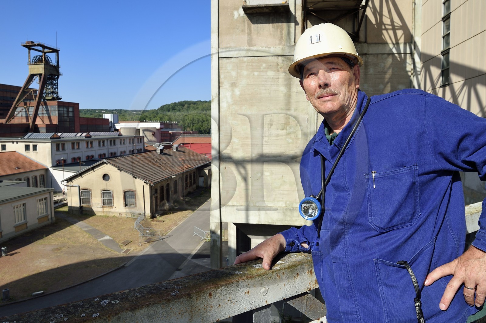 France, Moselle, Petite Rosselle, carreau Wendel museum, the former miner Gaston Mai in front of the mine shaft headframe Wendel 3