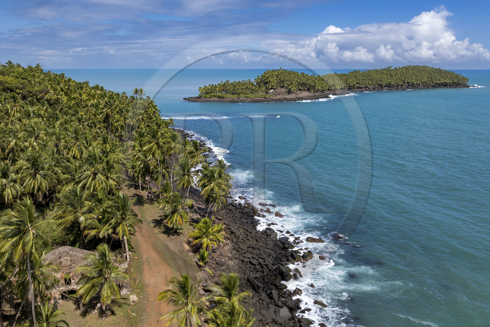 France, French Guiana, Kourou, Salvation Islands (Iles du Salut), Devil's Island, opposite Royal Island, served as a penal colony for political prisoners, including Alfred Dreyfus, ruins of the works workshop in the foreground (aerial view)