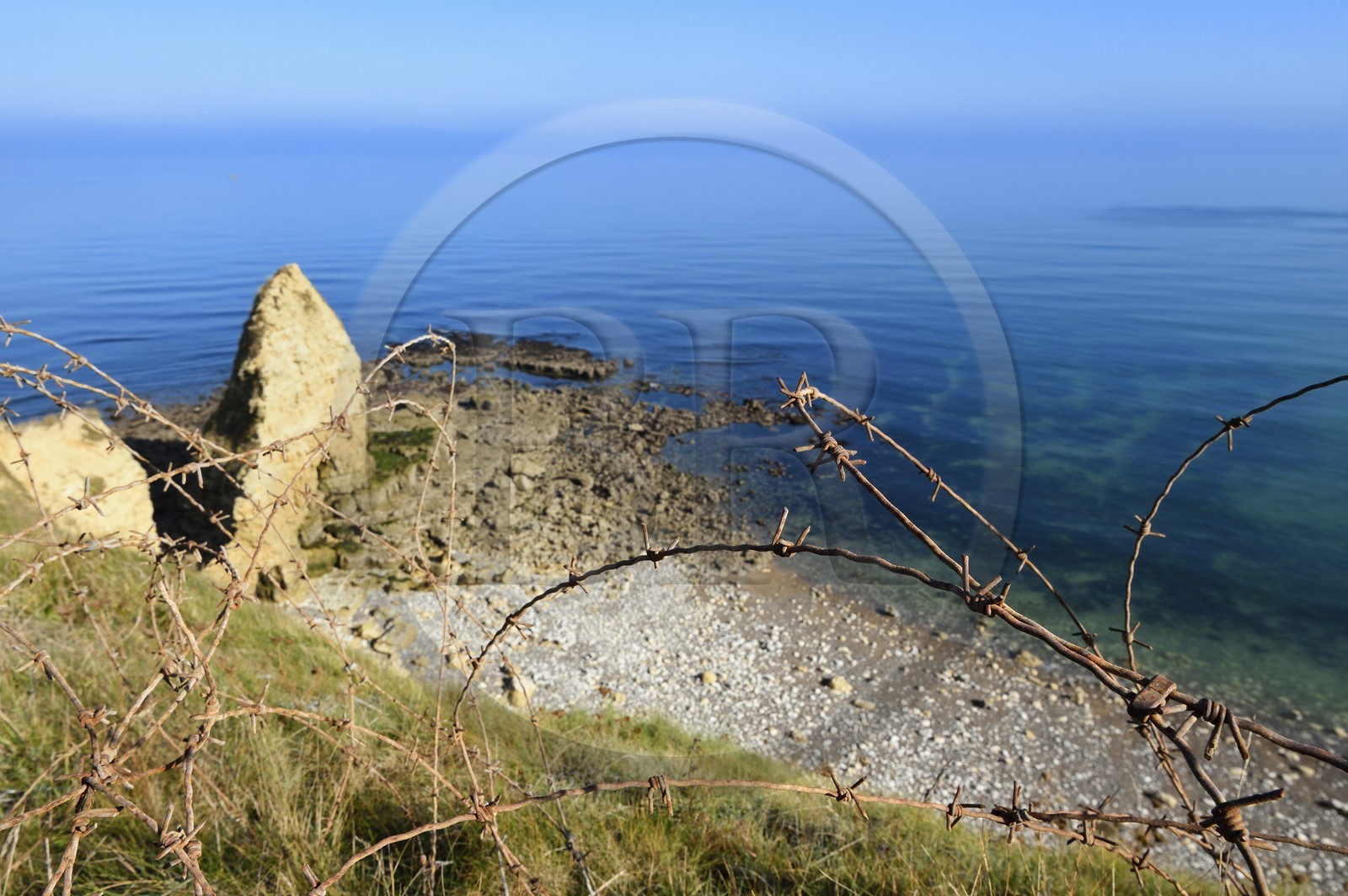 France, Calvados, Cricqueville en Bessin, Pointe du Hoc, barbed wire from a blockhouse