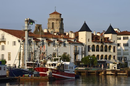 France, Pyrenees Atlantiques, Basque Country, Saint Jean de Luz, the fishing port, the white facade of the town hall, the house of Louis XIV on the right and the Saint-Jean-Baptiste (Saint John the Baptist) Church