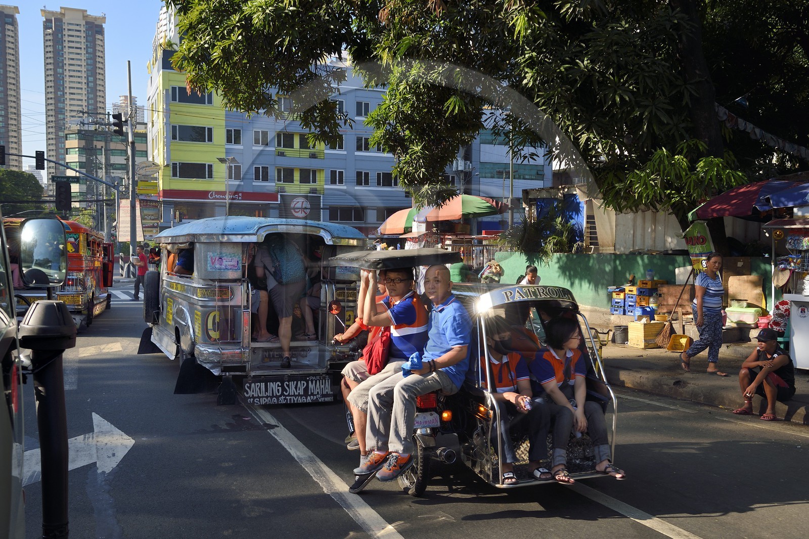 Philippines, Luzon island, Manila, Ermita district, tricycle motorcycle taxi on Maria Orosa Ave.