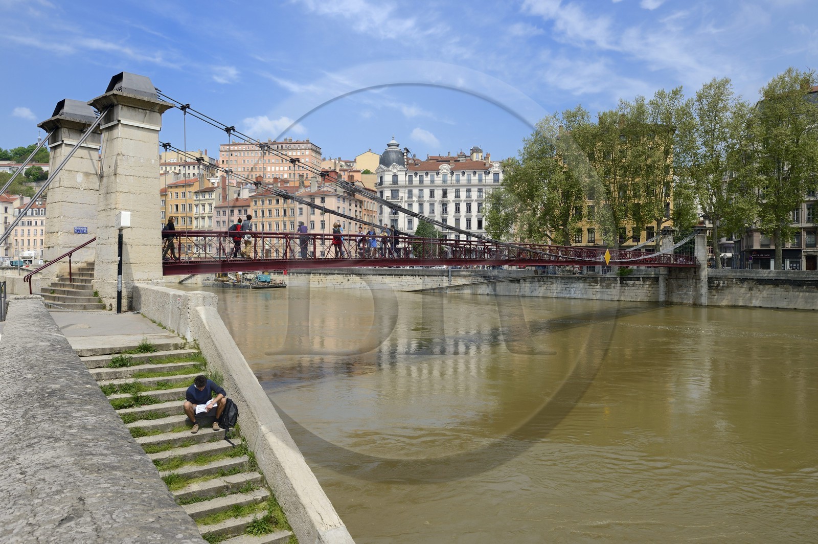 France, Rhone, Lyon, historical site listed as World Heritage by UNESCO, Quai Bondy, the Saint Vincent Footbridge over the Saone River and the Croix Rousse District in the background