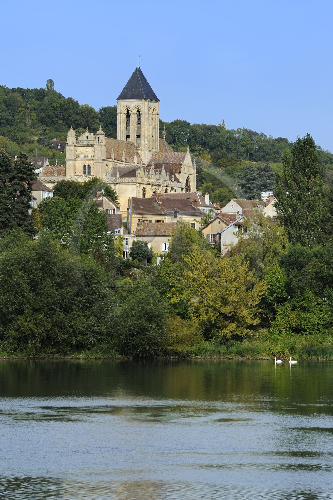 France, Val-d'Oise, Vetheuil village and its Notre Dame church painted by Claude Monet overlooking the Seine river