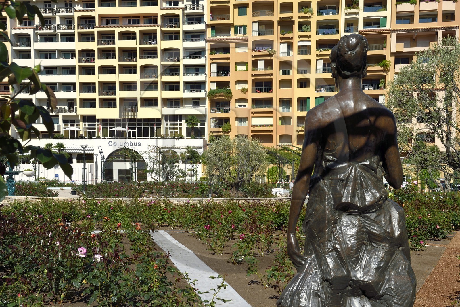 Principality of Monaco, Fontvieille, Princess Grace Rose Garden and her statue, hotel Columbus in the background