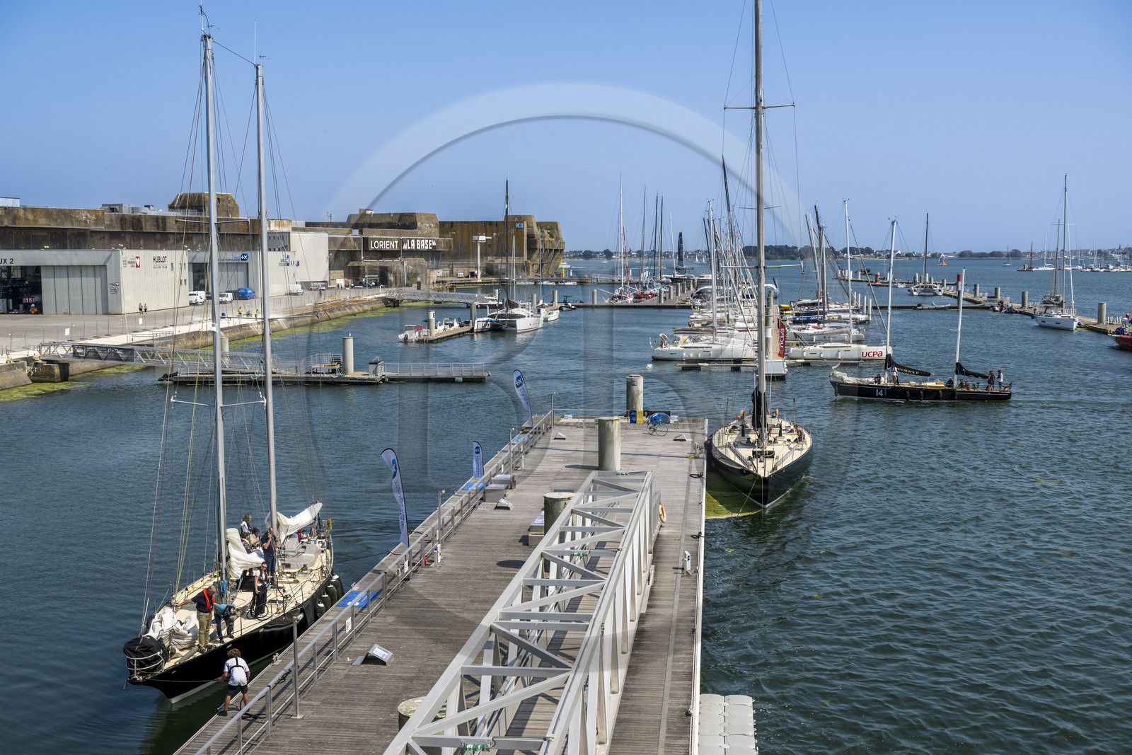 France, Morbihan, Lorient, Lorient La Base, former submarine base built by the Germans during the Second World War,  Cité de la Voile Eric Tabarly, the port of the 5 Pen Duick, Eric Tabarly's boats arrive on the pontoons