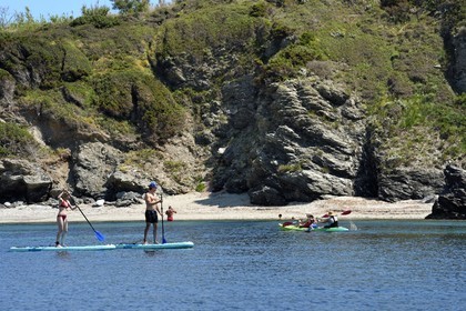 France, Var, Six Fours les Plages, Ile des Embiez, cape Saint Pierre, Freestyle windsurfing champion Adrien Bosson on a paddle boarding excursion