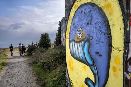 France, Loire Atlantique, Estuaire de la Loire, Saint Nazaire, Pointe de l'Eve, graffiti along the GR 34 long-distance hiking trail