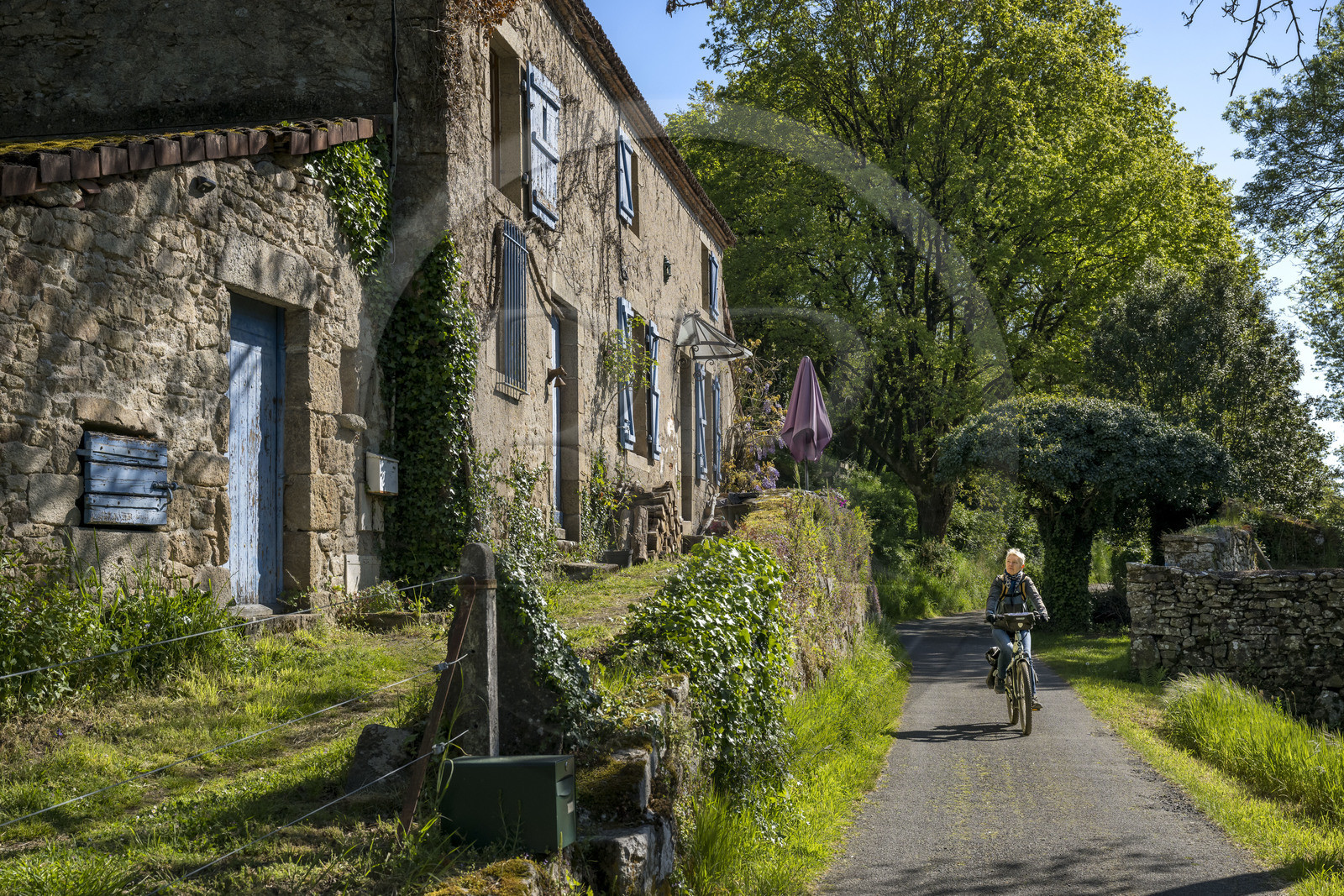 France, Vendee, Mortagne sur Sèvre, cycling tour in the Sèvre Nantaise river valley passing in front of the former moulin de la Garde