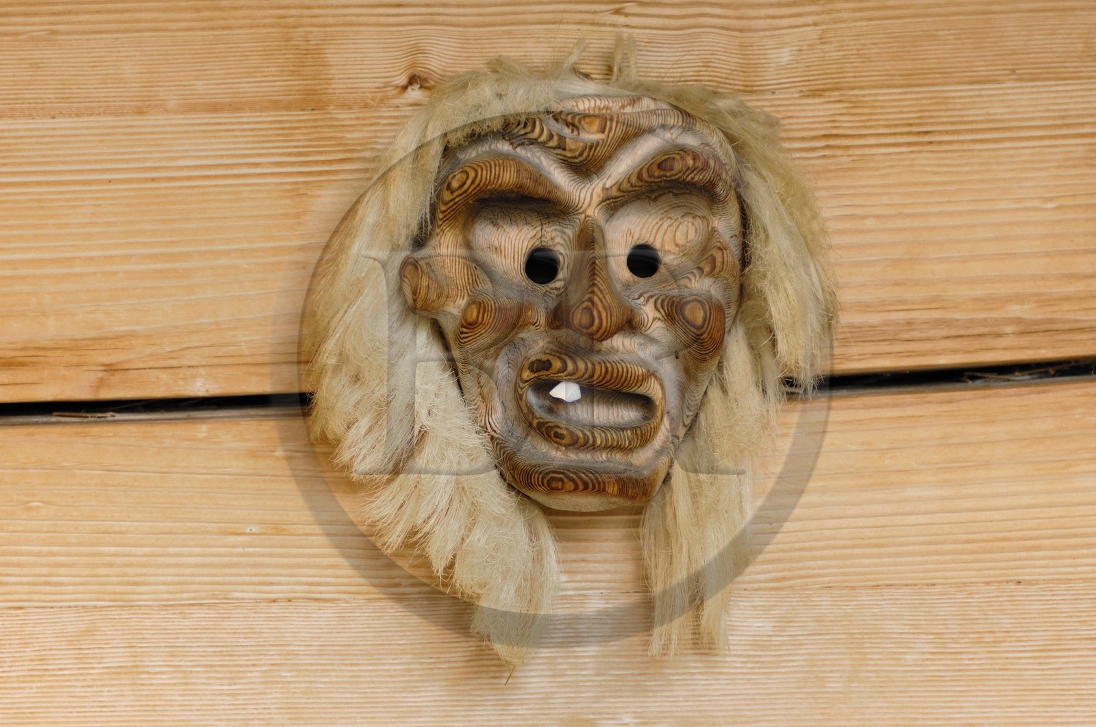 Switzerland, Canton of Bern, Bernese Oberland, Murren village, traditional wooden mask