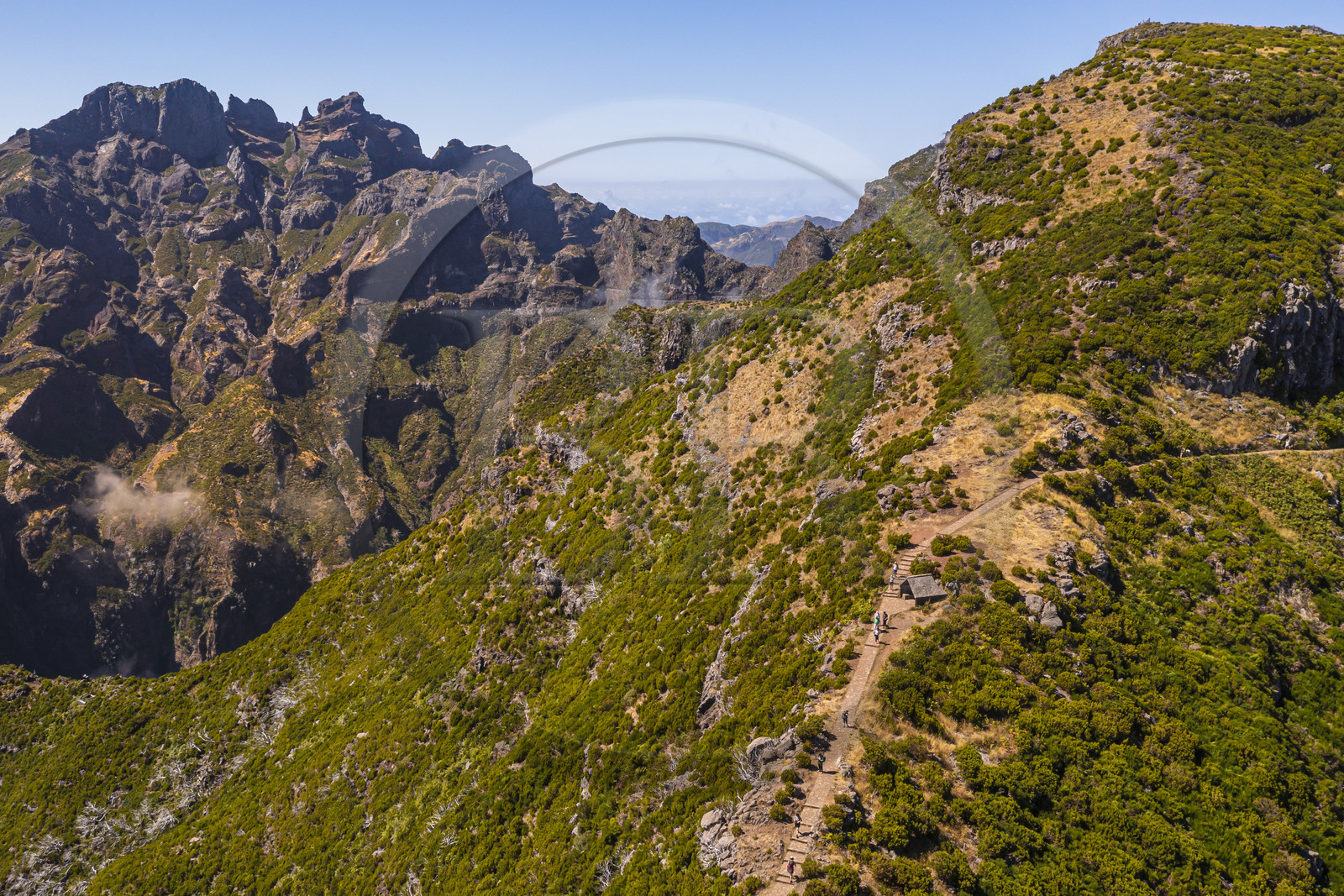 Portugal, Madeira Island, Vereda do Areeiro hike between Pico Ruivo (1862m) and Pico Arieiro (1817m), the path that climbs from Achada do Teixeira, the Pico Das Torres on the left  and the Pico Ruivo on the right (aerial view)