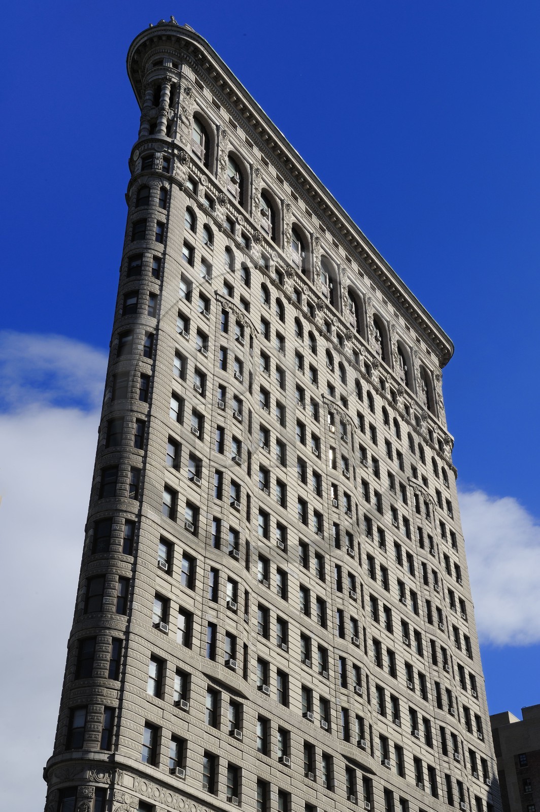 Etats-Unis, New York, Manhattan, quartier de Midtown, Flatiron Building, immeuble en forme de fer à repasser occupé par des bureaux