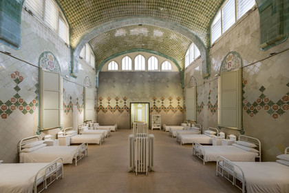 Spain, Catalonia, Barcelona, El Guinardo district, former Hospital de la Santa Creu i de Sant Pau listed as UNESCO World Heritage, modernist style by architect Domenech i Montaner, today a museum and a cultural center, the Saint Raphaël (Sant Rafael) pavilion which welcomed patients with digestive problems