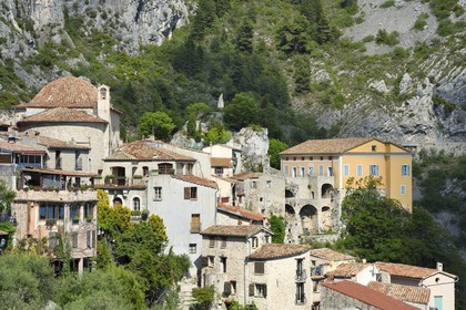 France, Alpes-Maritimes, the hilltop village of Peille, the Chapel of St. Sebastian (town hall), the War Memorial and the Palais Lascaris, right on the edge of the cliff
