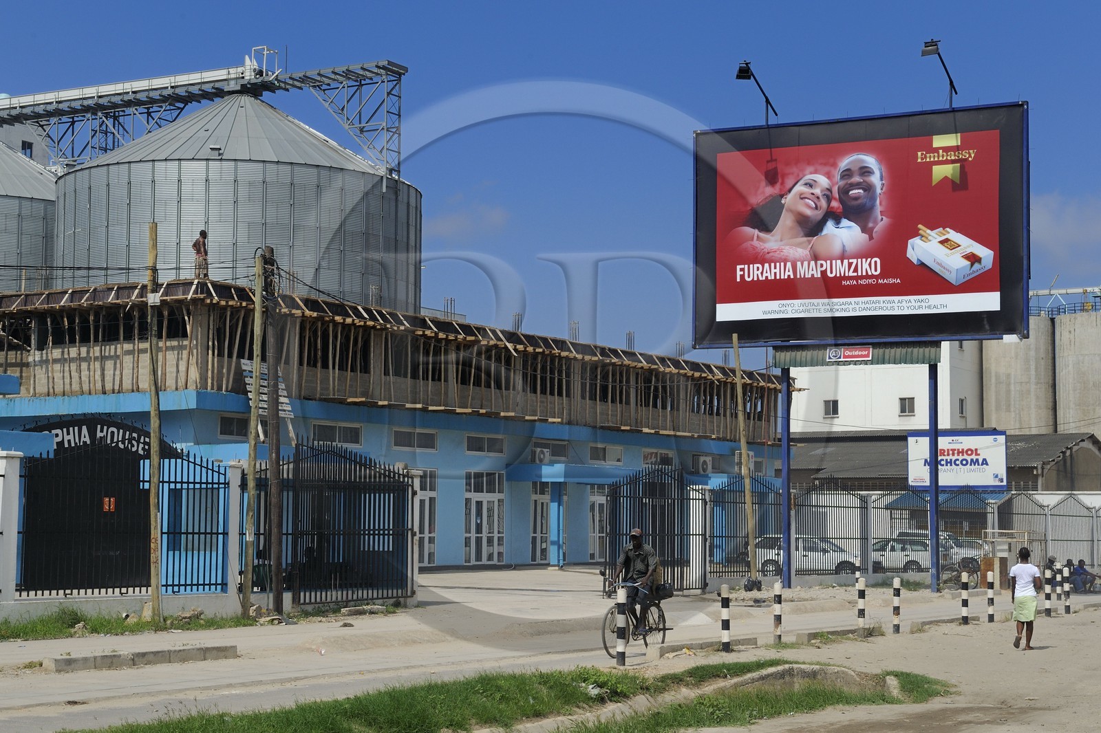 Tanzania, Dar es-Salaam, advertising posters in the suburb for cigarettes