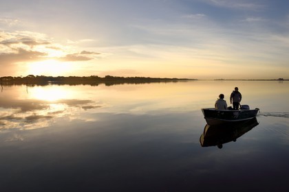 France, Haute Corse, the pond of Biguglia (Stagnu di Chiurlinu) at dawn, nature reserve of Corsica (RNC), Paul-Marie Ghipponi guard of the natural reserve of Corsica (RNC) patrolling the pond
