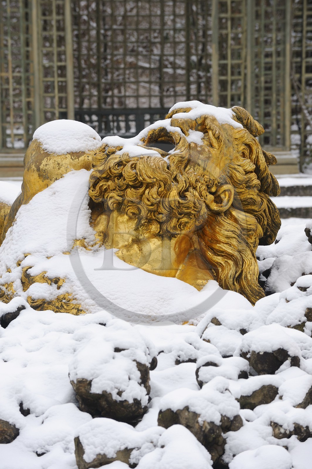 France, Yvelines, snow covered park of the Chateau de Versailles, listed as World Heritage by UNESCO, Bosquet de l'Encelade (Encelade Grove) by Marsy