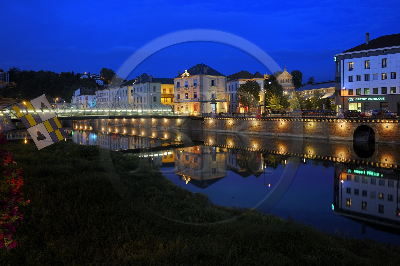France, Vosges, Epinal, quai Jules Ferry along the Moselle River and the Basilica of St. Maurice in the background