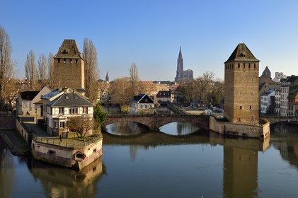 France, Bas Rhin, Strasbourg, old town listed as World Heritage by UNESCO, Petite France District, defensive towers of the covered bridges and Notre-Dame cathedral in the background