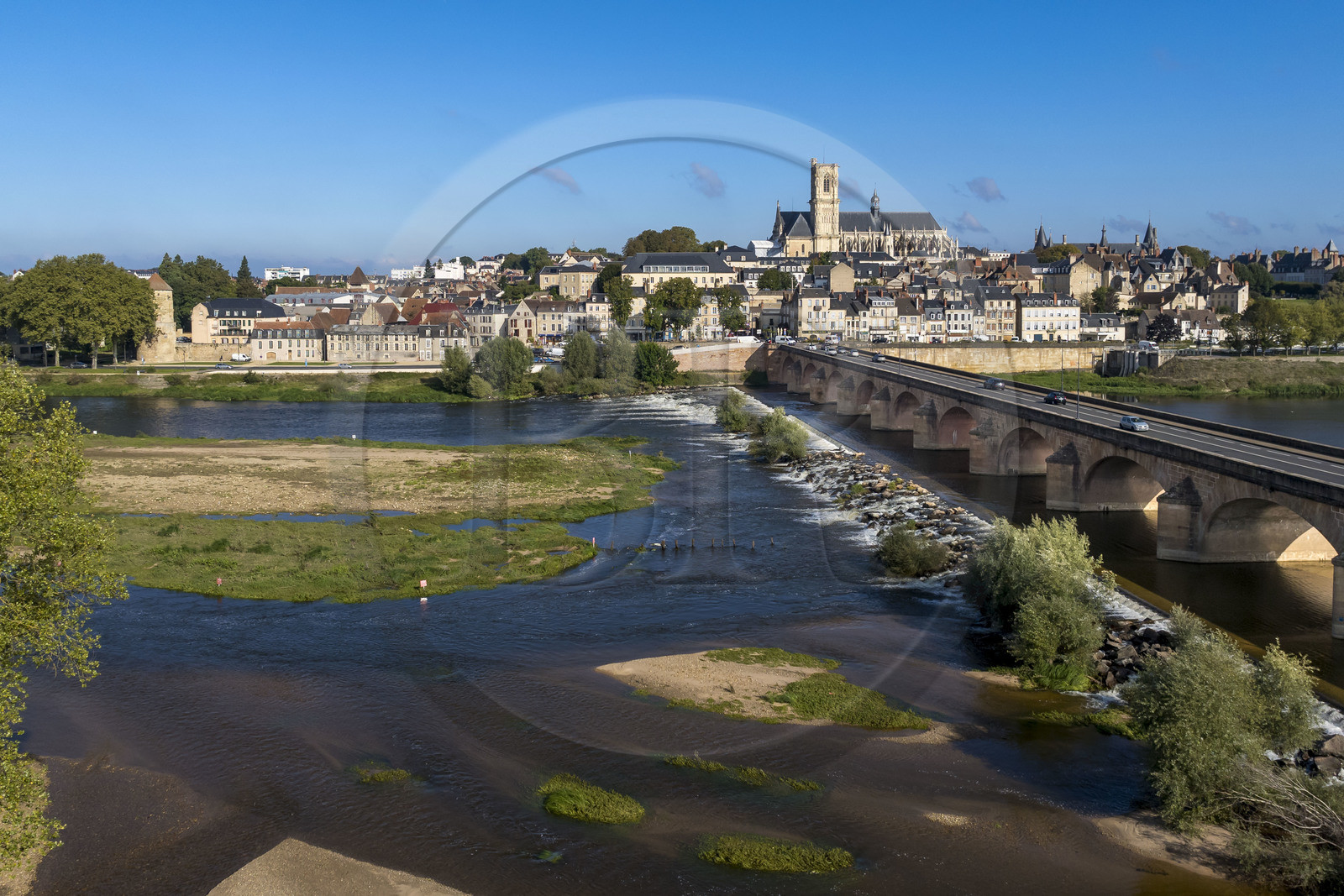 France, Nièvre, Nevers, the Loire downstream from the Pont de la Loire and the Saint-Cyr-et-Sainte-Julitte cathedral in the background (aerial view)