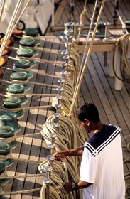 Caribbean sea, the five masted ship SPV Royal Clipper, sailor working on the deck