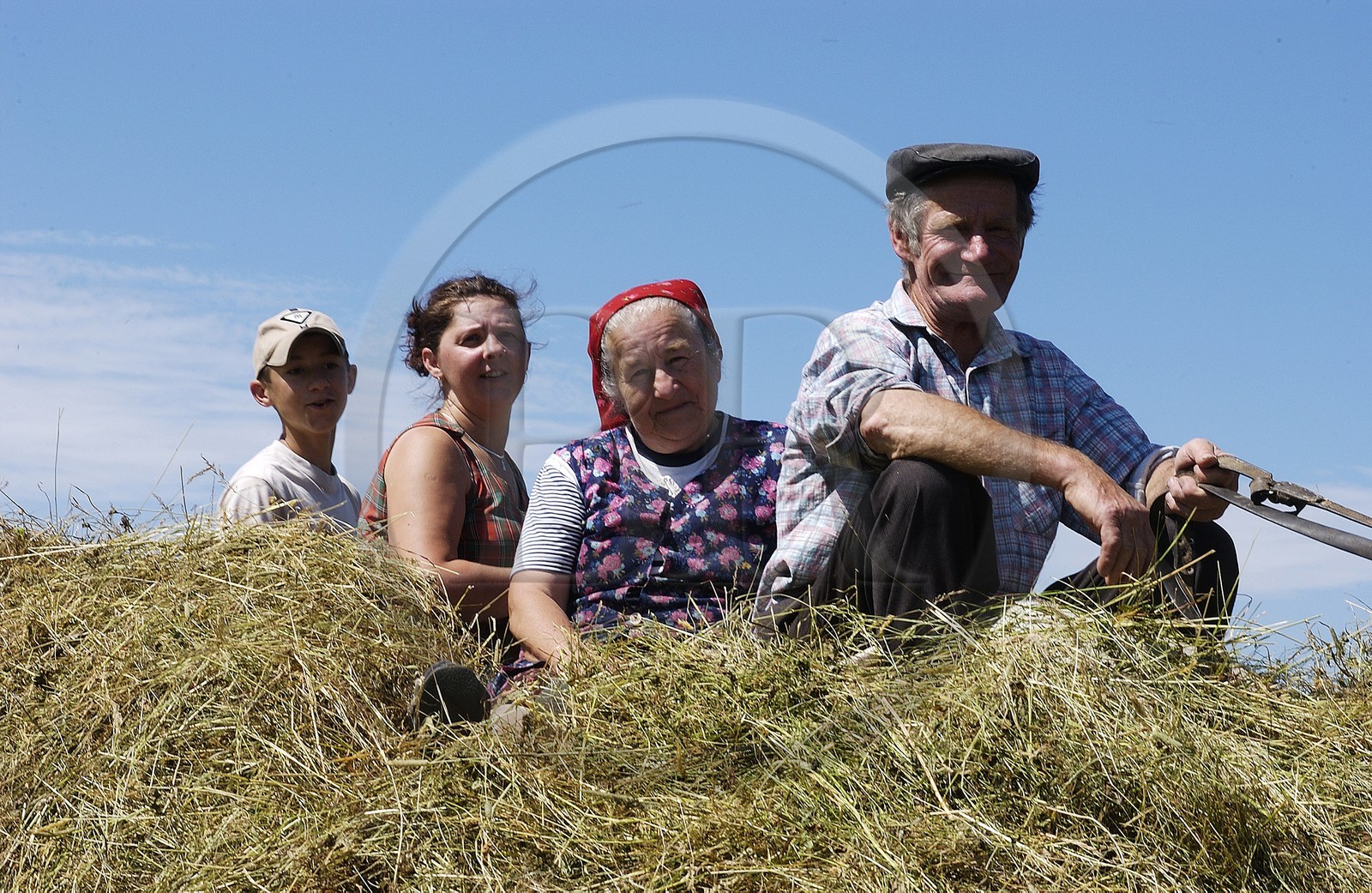 Poland, Lesser Poland, Carpathian Mountains, family of peasants coming back from making the hays towards the village of Debno