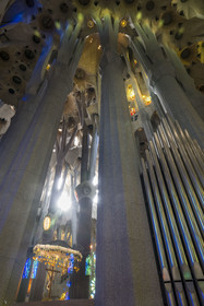 Spain, Catalonia, Barcelona, Eixample district, Sagrada Familia basilica by Catalan modernist architect Antoni Gaudi, listed as a UNESCO World Heritage Site, the presbyterium, a choir reserved for the clergy, surmounted by the crucified Christ hanging from a suspended canopy