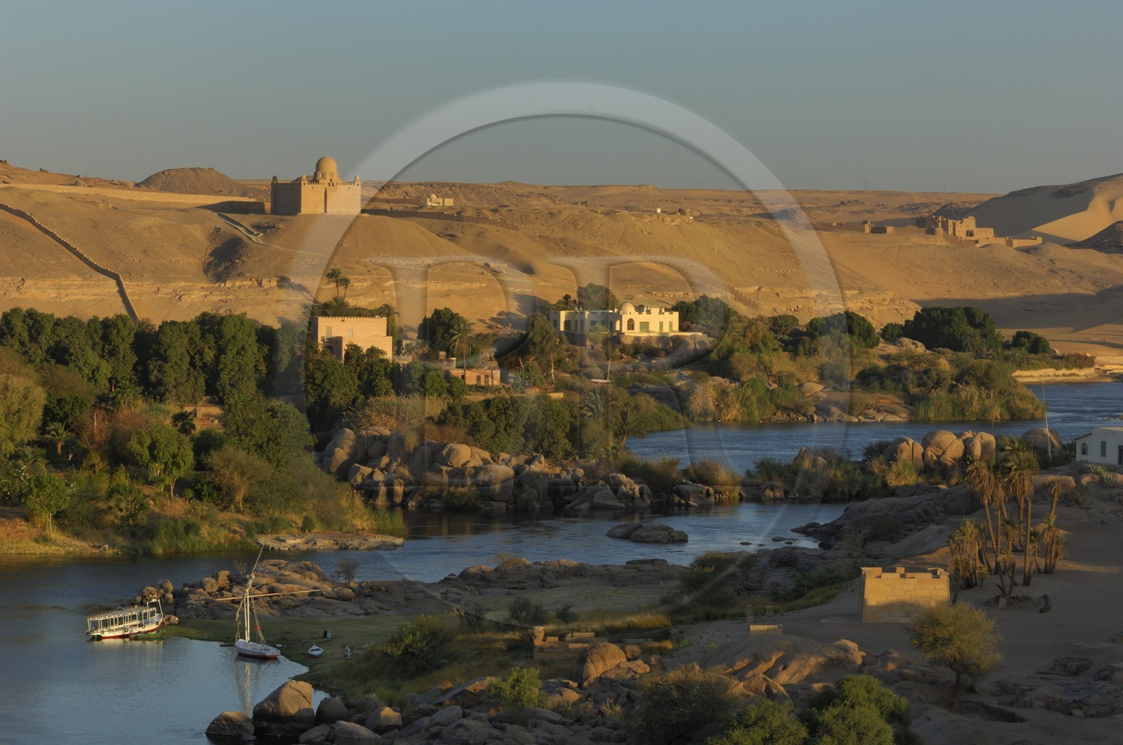 Egypt, Upper Egypt, Nubia, Nile Valley, Aswan, Elephantine Island and the Agha Khan mausoleum in the background on the western bank