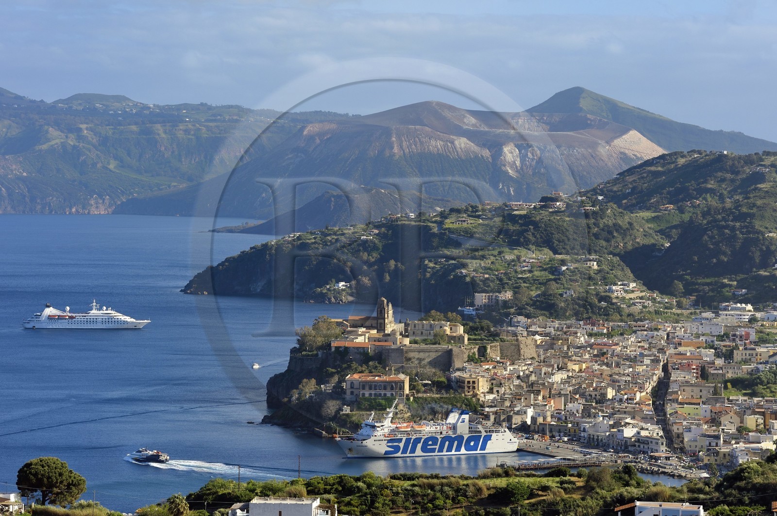 Italy, Sicily, Aeolian Islands, listed as World Heritage by UNESCO, Lipari Island, the town of Lipari and Vulcano Island volcano in the background