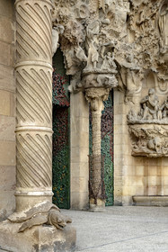 Spain, Catalonia, Barcelona, Eixample district, Sagrada Familia basilica by Catalan modernist architect Antoni Gaudi, listed as a UNESCO World Heritage Site, facade of the Nativity, turtle supporting one of the columns of the Charity Gate