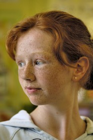 Republic of Ireland, County Galway, Aran Islands, Inishmore, Onaght, redhead girl at the village 's local school