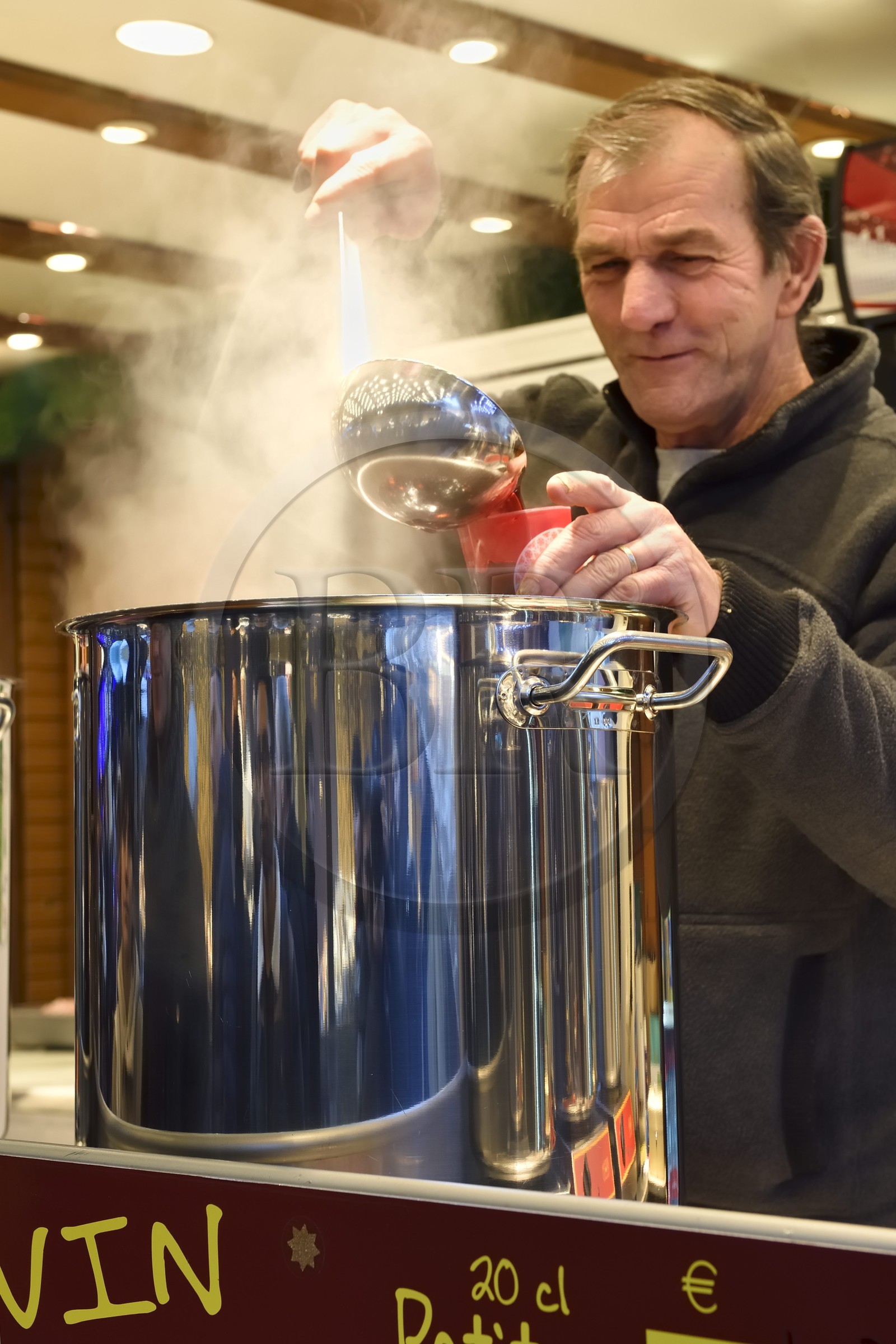 France, Bas Rhin, Strasbourg, old town listed as World Heritage by UNESCO, Christmas market (Christkindelsmarik) on the place Broglie, hot spiced wine stand