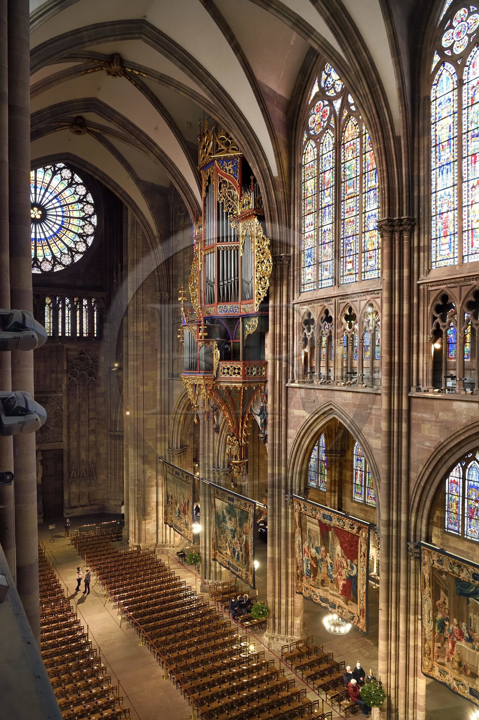 France, Bas Rhin, Strasbourg, old town listed as World Heritage by UNESCO, Notre Dame Cathedral, the great organ and the big Rose Window of the western facade, the Scenes from the Life of the Virgin made at the request of Richelieu are a series of fourteen tapestries hung in the nave during the Advent period