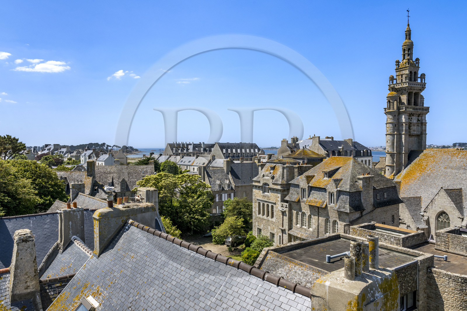 France, Finistère, Roscoff, the roofs of the old town overlooked by Notre-Dame de Croaz Batz church