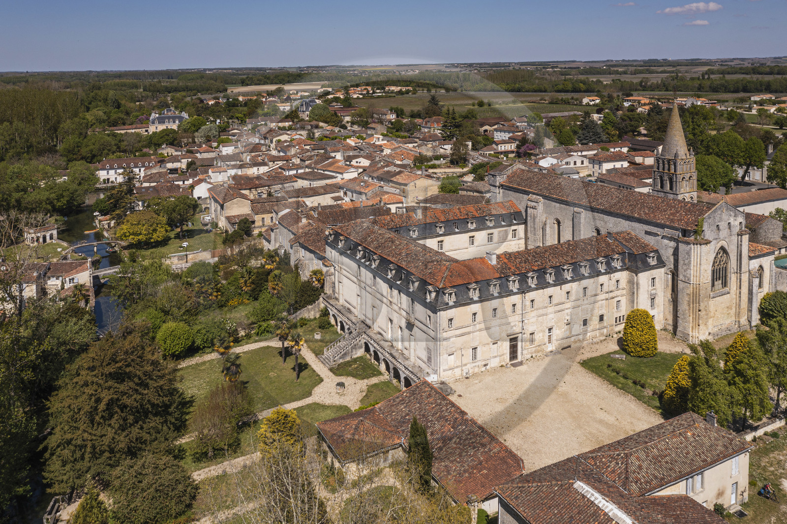 France, Charente, Bassac, the Saint-Étienne de Bassac abbey is a former abbey church of the diocese of Saintes (aerial view)