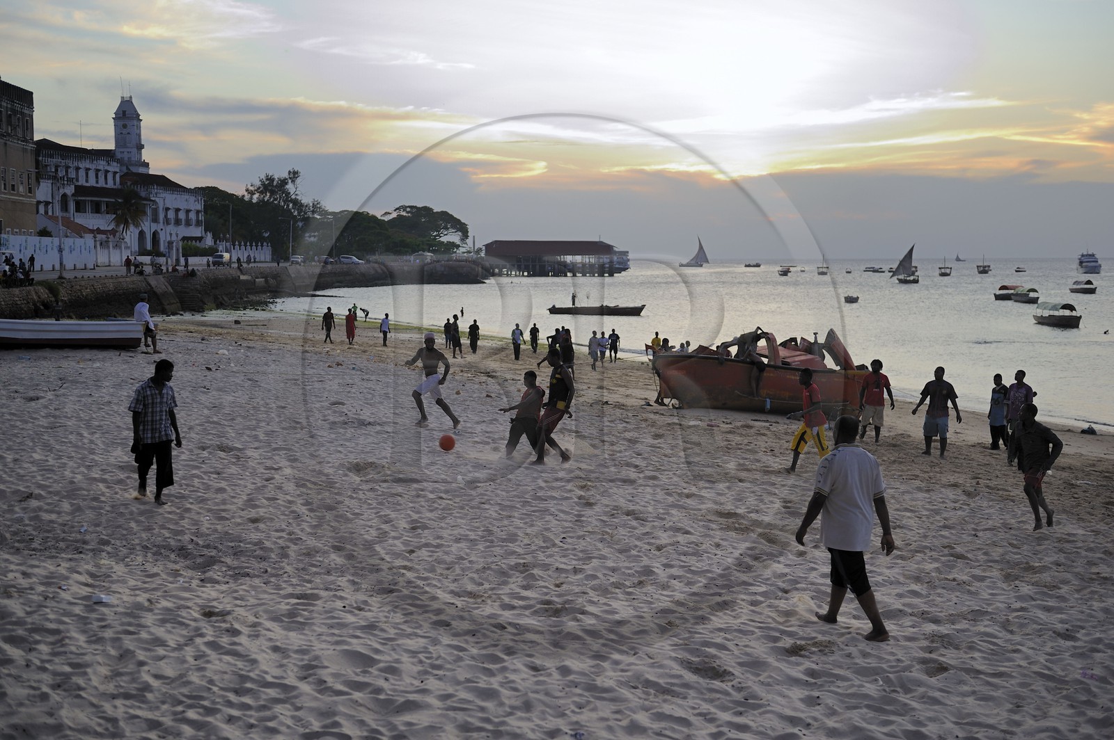 Tanzania, Zanzibar Archipelago, Unguja island (Zanzibar), Stone Town, listed as World Heritage by UNESCO, fooball players on the beach