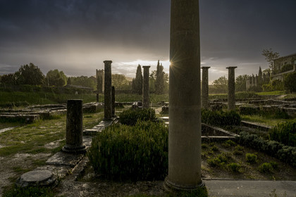 France, Vaucluse, Dentelles de Montmirail mountains,  Vaison la Romaine, Villasse archaeological site, remains of the House of the Dolphin under a rain shower