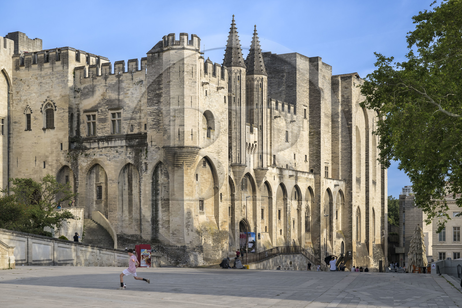 France, Vaucluse, Avignon, Palais des Papes (Palace of the Popes) listed as World heritage by UNESCO, the west facade on the Palace Square